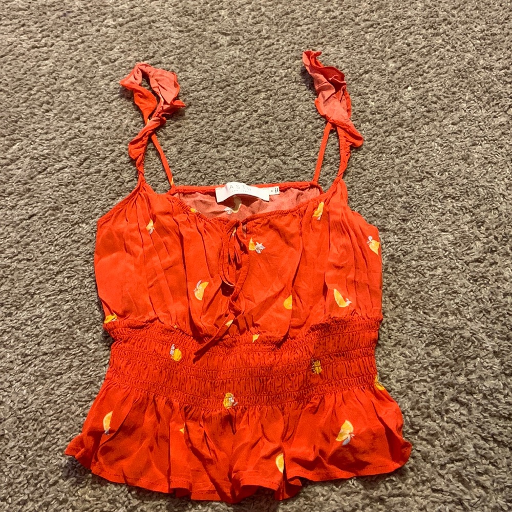 tank top with cute straps and cinching in the middle